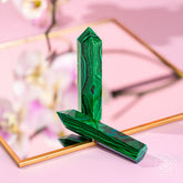 Malachite phoenix sculpture from Conscious Items, a striking home decoration piece with vibrant green and intricate details.