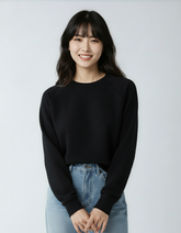 Black fleece crew neck sweatshirt for women by SpectraUSA, featuring a comfortable fit and classic design.