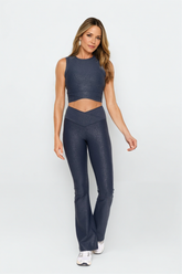 Luxe Edge leather-look crossover crop top from Fitkitty Culture Athleisure Wear, featuring a sleek design and stylish fit.