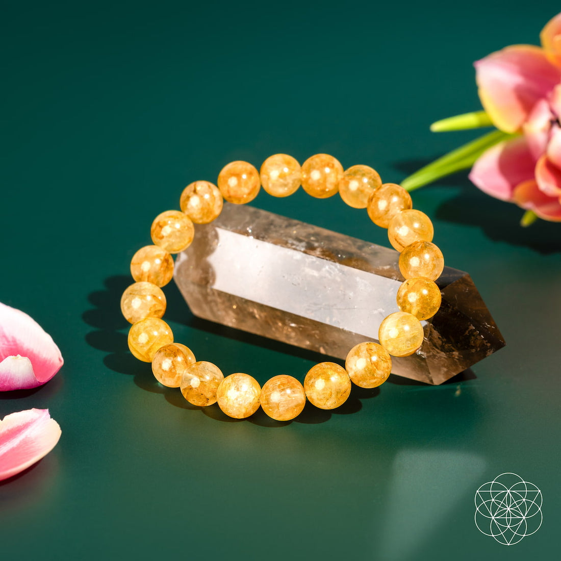 Golden Healer Quartz bracelet from Conscious Items featuring polished golden-hued crystals on a stretchy band.