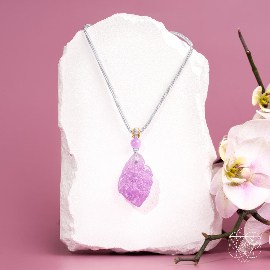 Pink Kunzite pendant necklace by Conscious Items featuring a large, oval-shaped pink gemstone on a delicate chain.