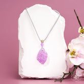 Pink Kunzite pendant necklace by Conscious Items featuring a large, oval-shaped pink gemstone on a delicate chain.