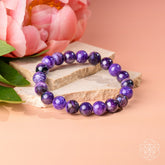 Unshakeable Intuition Siberian Charoite bracelet by Conscious Items featuring polished purple gemstone beads and a silver clasp.
