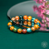 Ocean Jasper bracelet by Conscious Items featuring smooth, polished stones with earthy green and brown tones for calming energy.