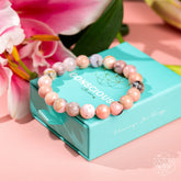 Peruvian pink opal bracelet featuring polished pink stones, designed by Conscious Items for a stylish and meaningful accessory.