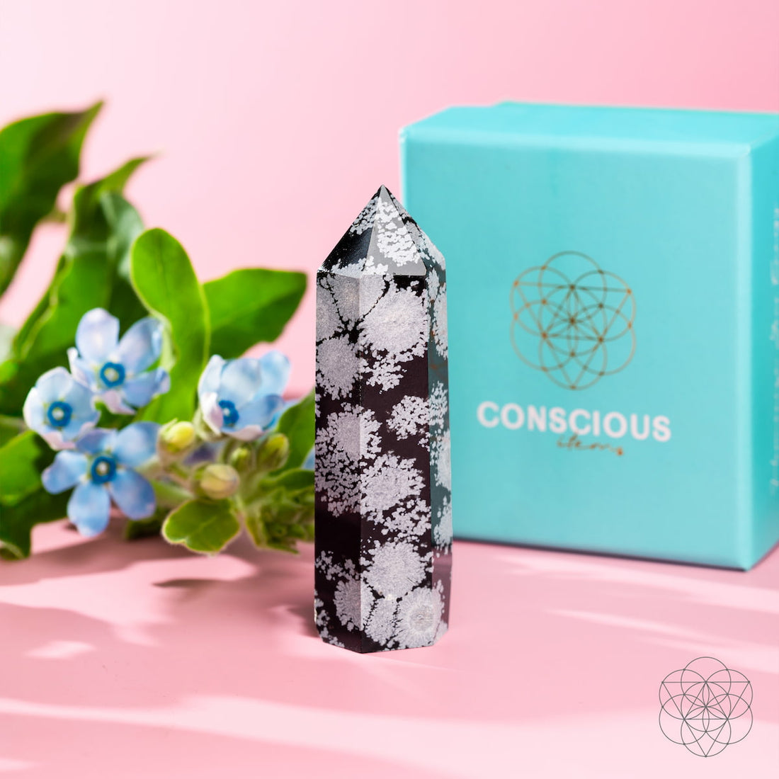 Snowflake Obsidian point from Conscious Items, spiritual bodyguard home decoration with black and white snowflake pattern.