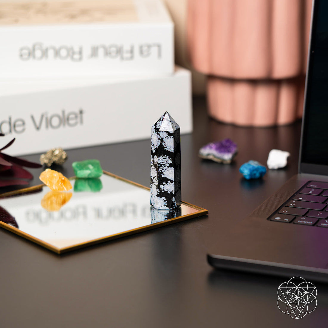 Spiritual Bodyguard Snowflake Obsidian Point home decoration by Conscious Items, showcasing a polished black stone with white snowflake patterns.