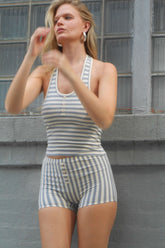 Bruna halter top in seaside stripe by findmenowthelabel, featuring a stylish halter neckline and vibrant seaside-inspired stripe pattern.