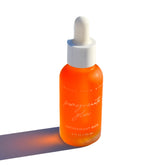 Pretty Farm Girl Pomegranate Glow Face Serum bottle with dropper, natural skin protecting serum for glowing skin.