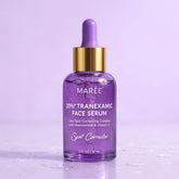 Maree dark spot corrector tube with applicator for reducing dark spots and uneven skin tone on the face.