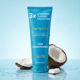 Maree Deep Hydrating Coconut Conditioner bottle with coconut imagery, showcasing a nourishing hair care product for deep moisture.