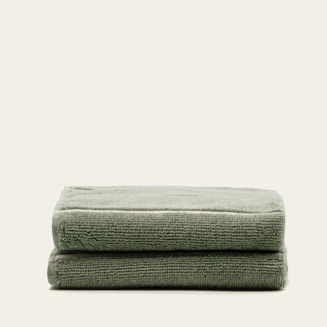 Italian Italic Deia Australian Cotton Hand Towel with soft, absorbent white fabric and subtle woven texture for home bathroom use.