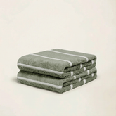 Deia Australian cotton hand towel from Italic, soft and plush home bed towel with natural white color and textured fabric.