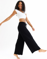 Downeast Demi Tee in soft fabric, featuring a relaxed fit and classic crew neckline, displayed on a hanger.