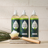 Puracy dish soap in a 16oz bottle, shown with three bottles in a pack, for effective and gentle dish cleaning.