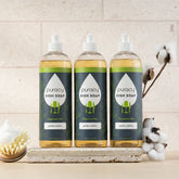 Puracy unscented dish soap 16oz bottles in a 3-pack, showing clear liquid soap with pump dispensers on a white background.