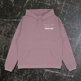 Front view of Any Means Necessary Clothing Dopamine Pullover Hoodie in washed plum color, showcasing its casual hoodie style.