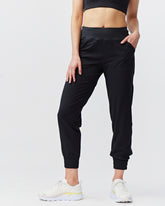 Black Goal Five Excel Jogger 7/8 length training pants with elastic waistband and tapered fit, displayed on a neutral background.