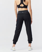 Black Goal Five Excel Jogger 7/8 length 28-inch training pants with elastic waistband and tapered fit, suitable for workout and active wear.