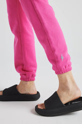 Pink electric fleece joggers from Fitkitty Culture athleisure wear, made of soft French terry fabric, designed for comfortable women&