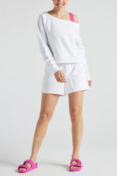 White electric fleece shorts from Fitkitty Culture athleisure wear, designed for comfortable women&