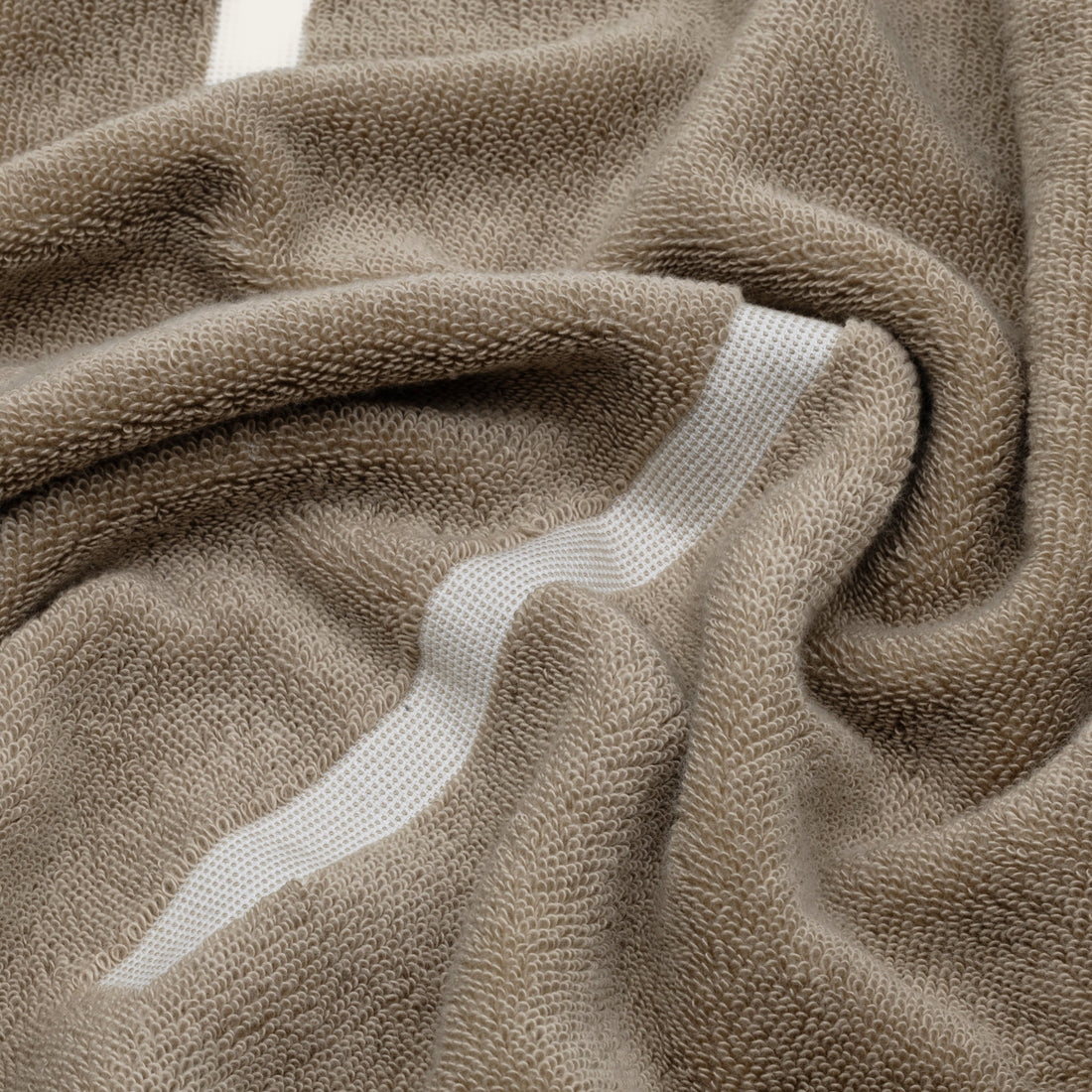 Soft Sorrel Australian cotton towels by Italic, showing plush, absorbent texture and elegant design in a close-up shot.