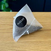 Box of August Uncommon Tea Essentials Black Gold Black Tea with 15 tea bags, packaged for brewing rich black tea.