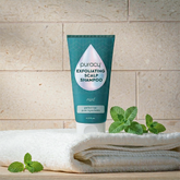 Puracy exfoliating scalp shampoo bottle with a clean label, designed to refresh and cleanse the scalp and hair.