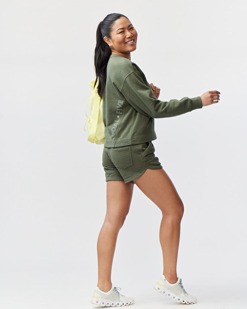 Goal Five Freasy Crew lifestyle sweatshirt in dark moss color, featuring a comfortable fit and casual style.