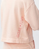 Goal Five Freasy Crew lifestyle image showing a comfortable, stylish casual sweatshirt in a natural setting.