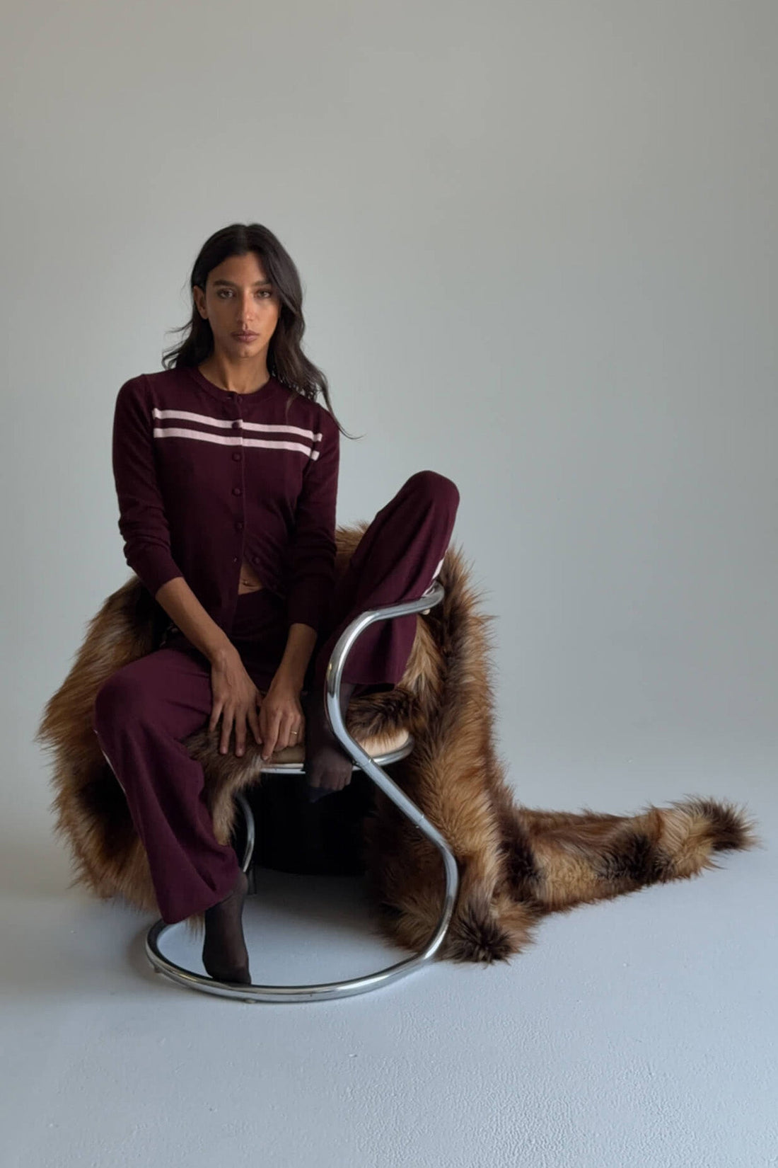 Findmenowthelabel cashmere wool stripe cardigan in raspberry cream, showcasing soft knitwear with colorful horizontal stripes.