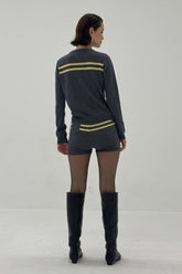 Charcoal and butter striped cashmere wool cardigan by findmenowthelabel, featuring a cozy knitwear design with a button front.