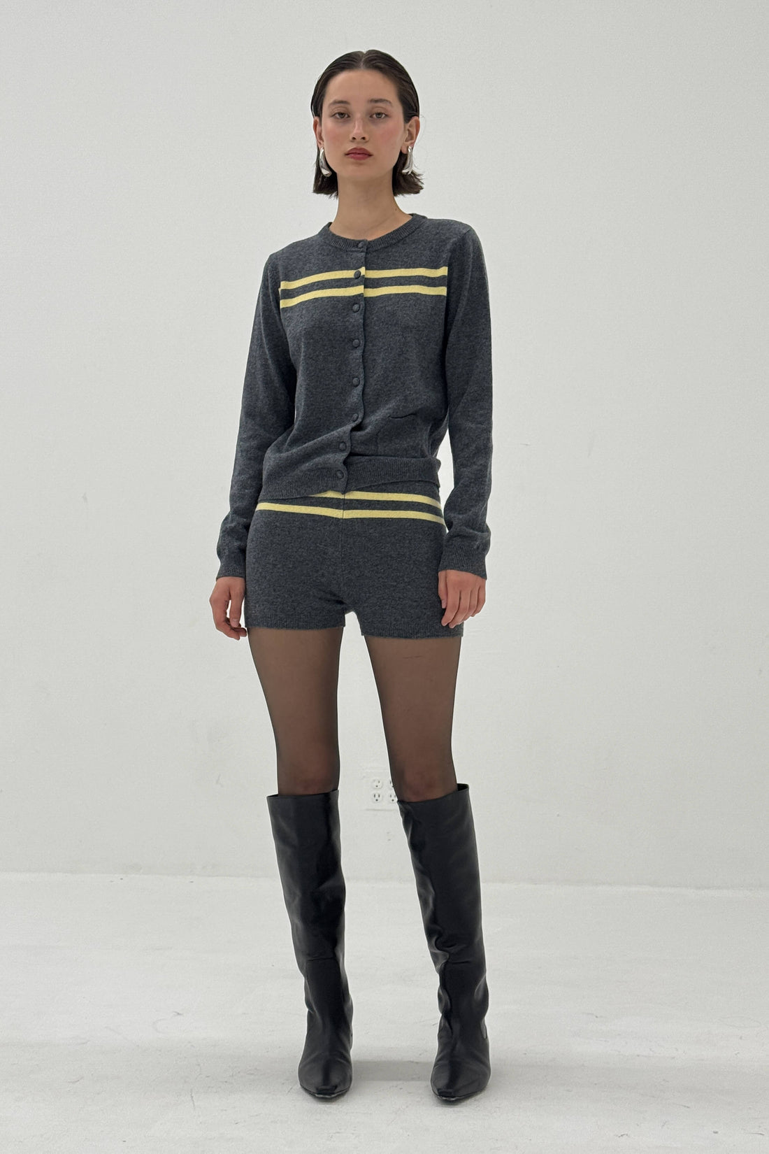 Charcoal and butter striped cashmere wool cardigan from findmenowthelabel, showcasing a cozy knitwear design.