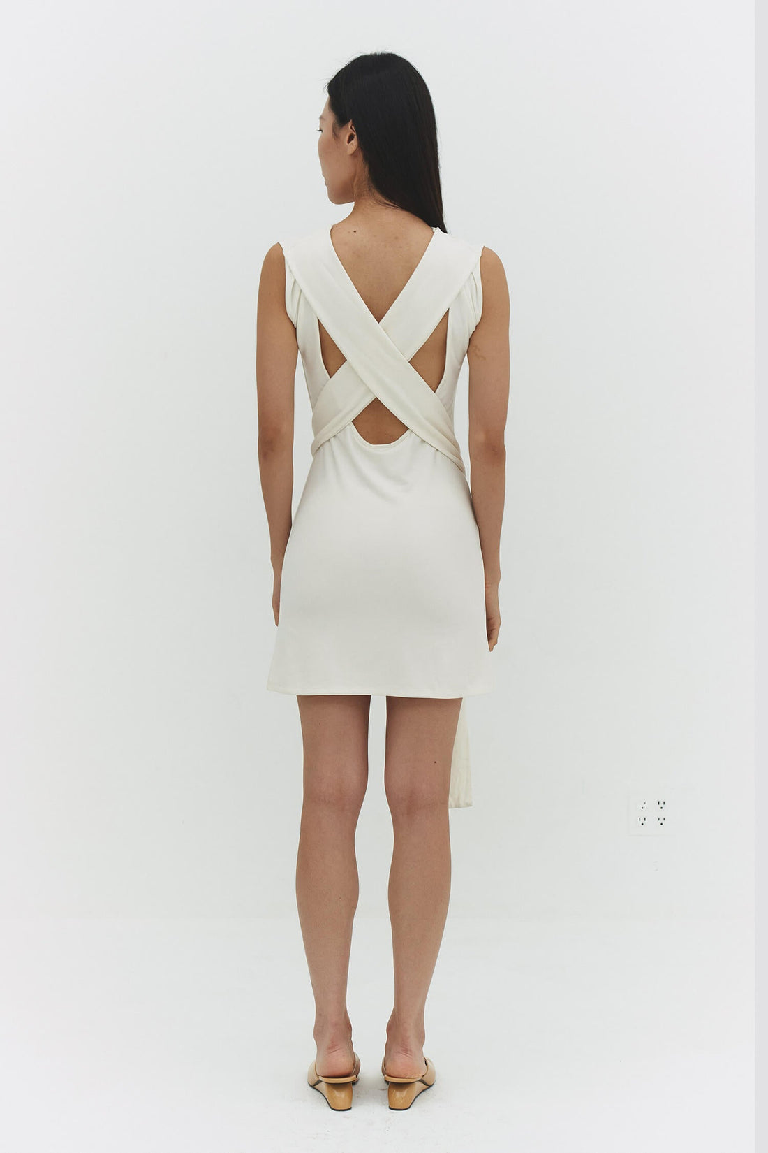 FindmeNowTheLabel Beatriz mini dress in off-white, stylish sleeveless dress with a fitted silhouette and elegant design.