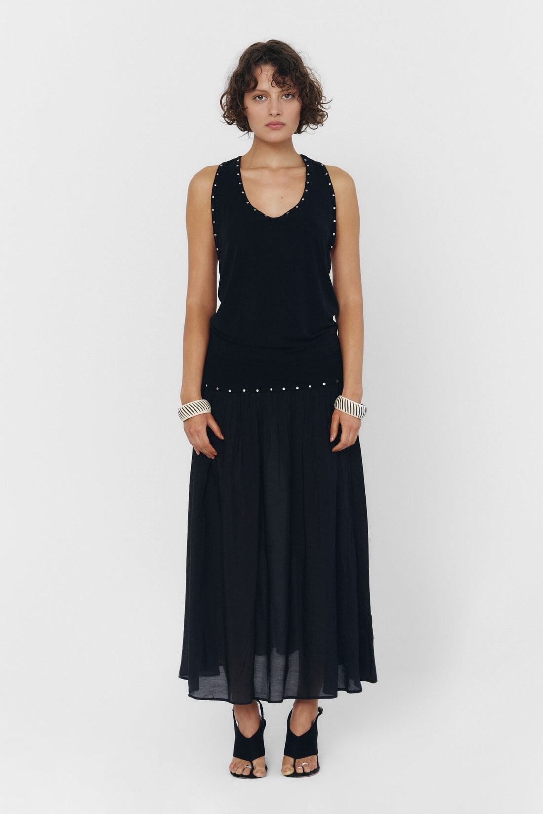 Findmenowthelabel YUNA black tank top, sleeveless casual top with a fitted style, shown on a model.