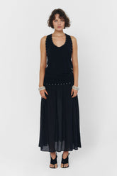 Findmenowthelabel YUNA black tank top, sleeveless casual top with a fitted style, shown on a model.