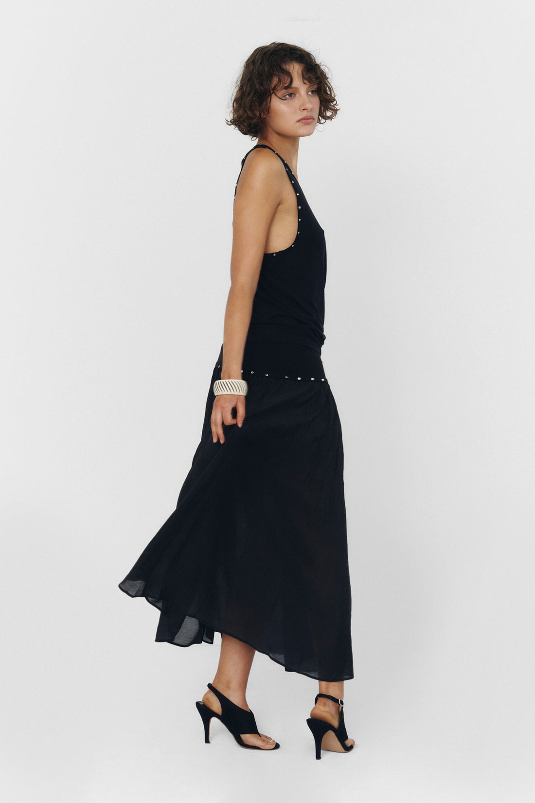 Black YUNA tank top by findmenowthelabel, featuring a sleeveless design and fitted style, shown on a mannequin.