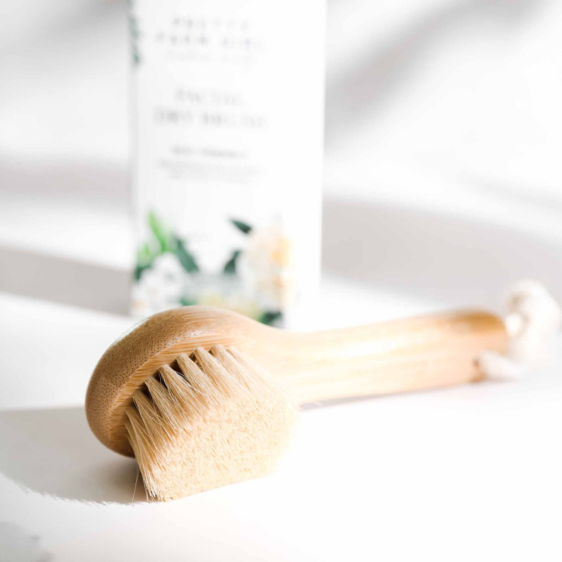 Pretty farm girl dry face brush accessory for gentle cleansing and exfoliation of facial skin.