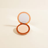 Fair shade YENSA Super Serum Silk Matte Powder Peptide Foundation pressed powder in a compact container with a smooth, matte finish.