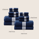 Family bundle of Nautilus Australian Cotton Bath Towels by Italic, showing soft, plush white towels in a cozy home setting.