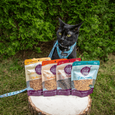 Farm To Pet beef crumbles cat treats in front of the bag, featuring chicken, turkey, fish, and high-protein ingredients for cats.