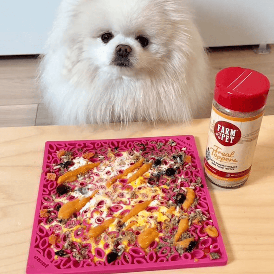 Large pink floral Farm To Pet dog lick mat with square design, ideal for keeping dogs entertained and occupied.