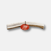 Farm To Pet all-natural split elk antler dog chews showing textured surface and size, ideal for durable, healthy canine treats.