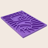 Purple Farm To Pet Lick Mat for cats and small dogs, groovy design, side view showing textured surface for licking fun.