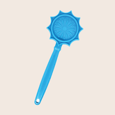 Close-up of Farm To Pet Lick Stick, an interactive blue flower-shaped dog training toy designed for engaging canine play.
