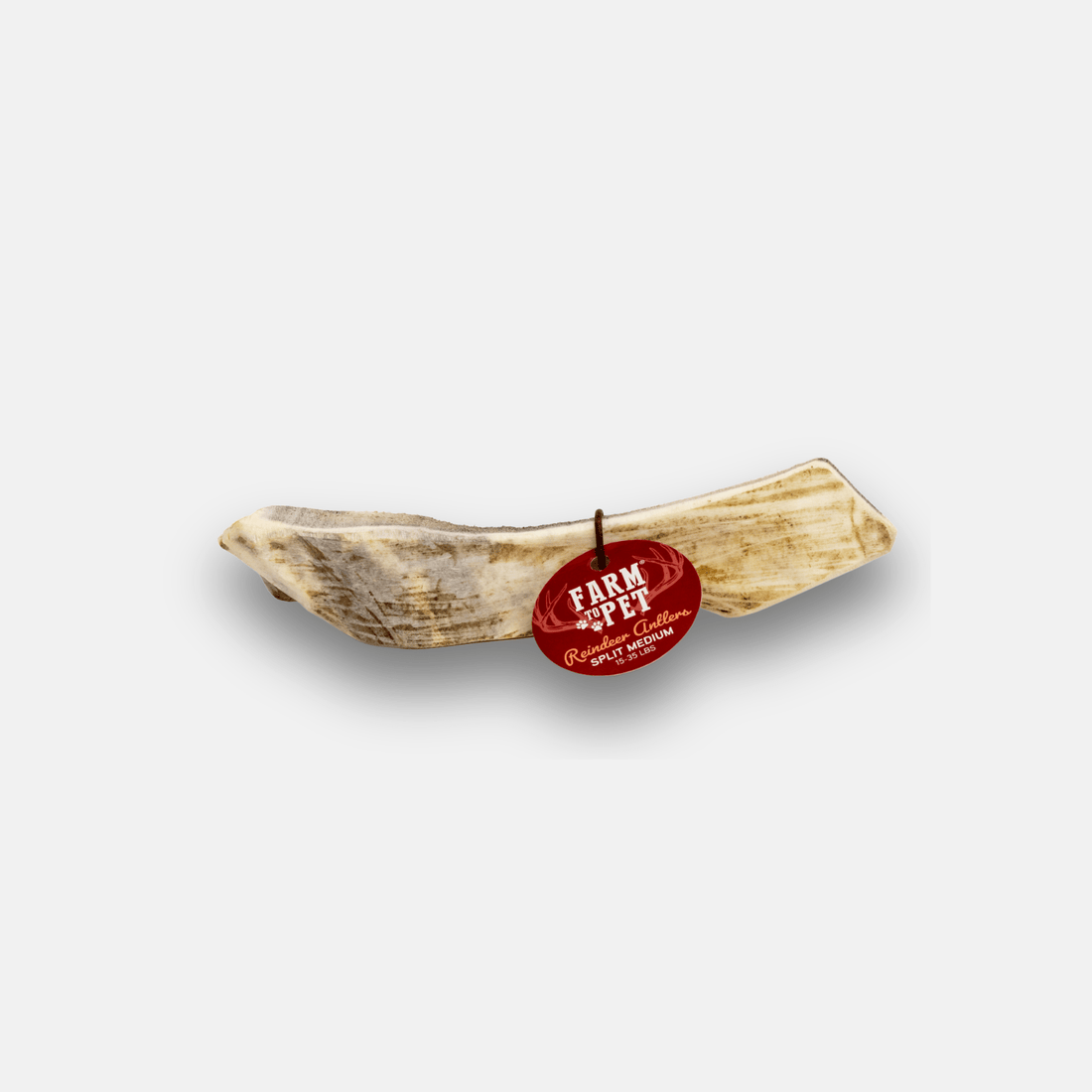 Farm To Pet organic reindeer antler dog chew, medium-sized split antler with natural texture, for long-lasting dog chewing enjoyment.
