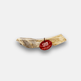 Farm To Pet organic reindeer antler dog chew, medium-sized split antler with natural texture, for long-lasting dog chewing enjoyment.