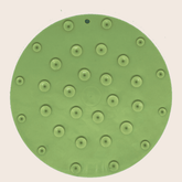 Green Farm To Pet round dog lick mat with suction cups, designed to entertain and soothe pets during feeding and grooming.