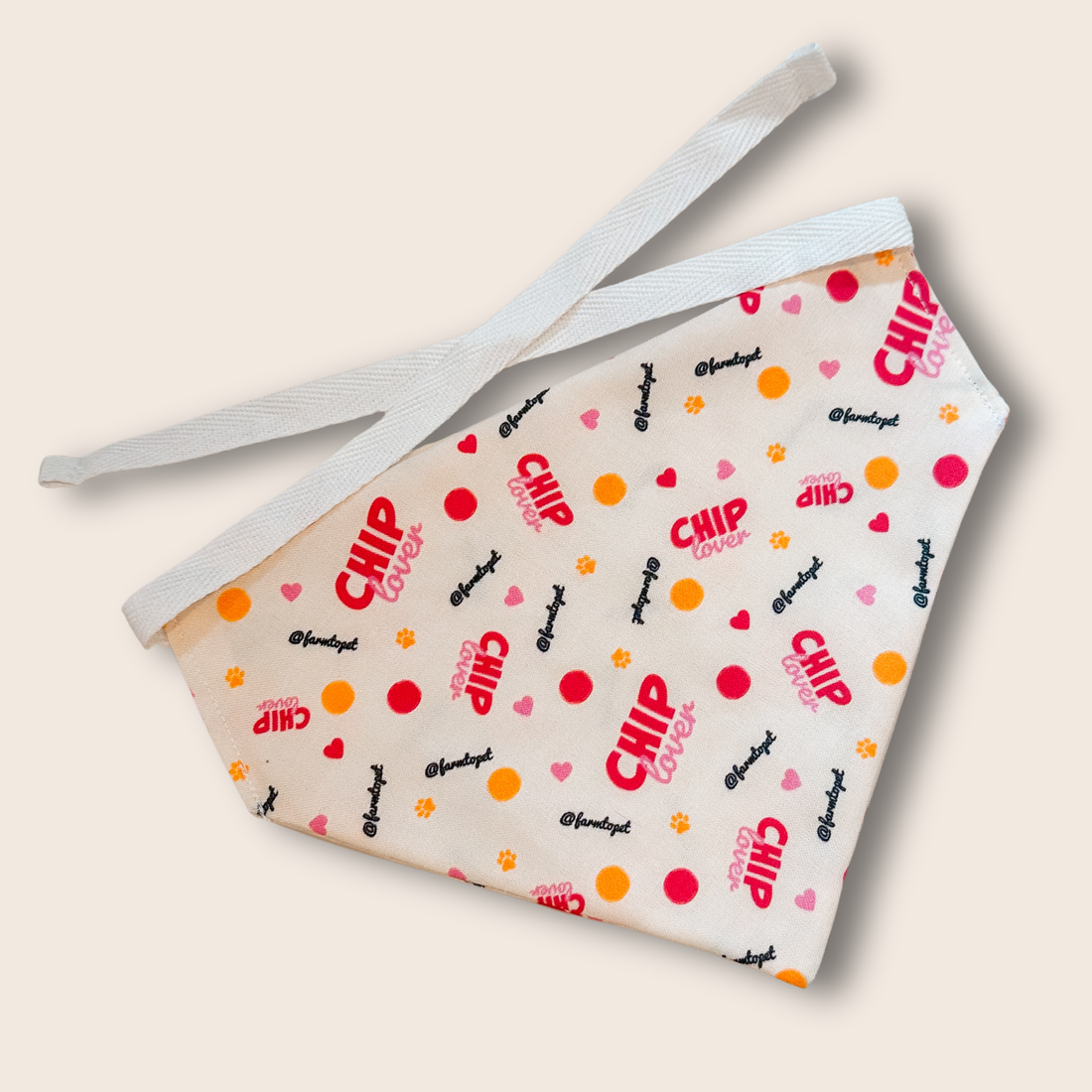 Farm To Pet tie-on dog bandana with adjustable string-tie, featuring a chip lover design, for dogs and cats.