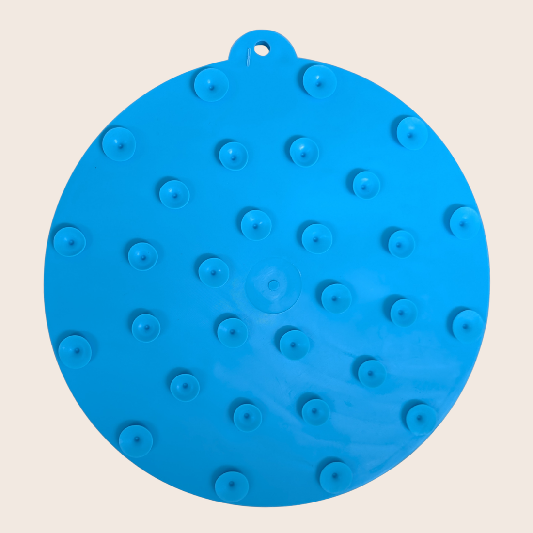 Blue round Farm To Pet dog lick mat with suction cups featuring an American flag design, designed to keep dogs entertained and calm.